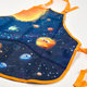 1838-0428 Dětská zástěra Cosmic adventure